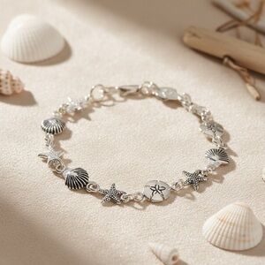 Silver Tone Seashell & Starfish Charm Bracelet